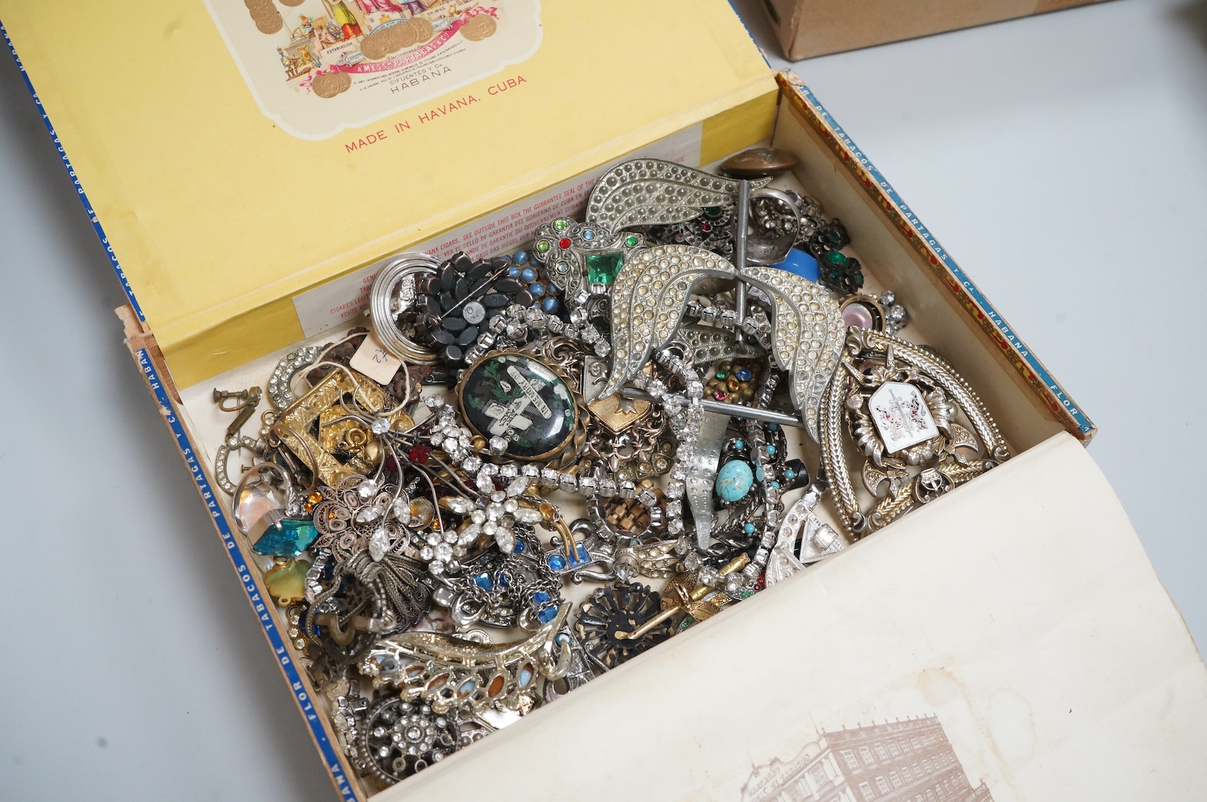 A group of assorted costume jewellery, glass beads etc.